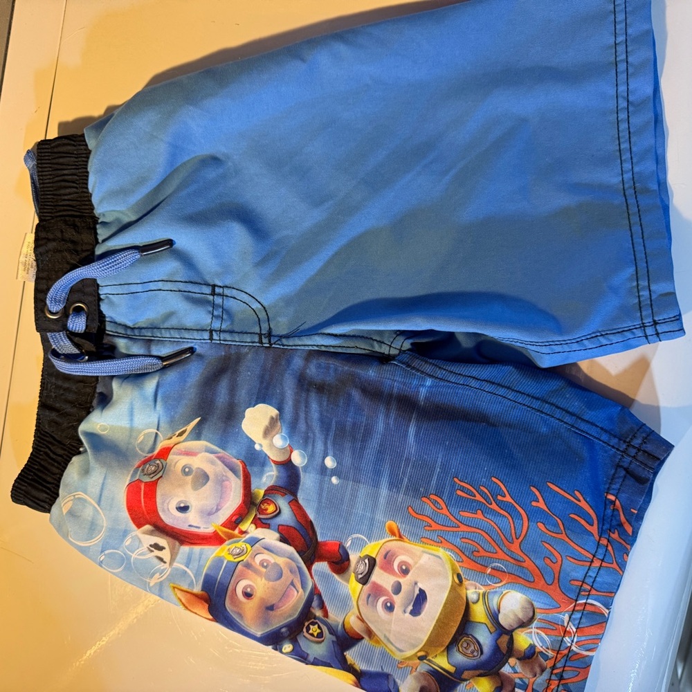 Blue and Black Paw Patrol Swim Trunks with Playful Character Designs